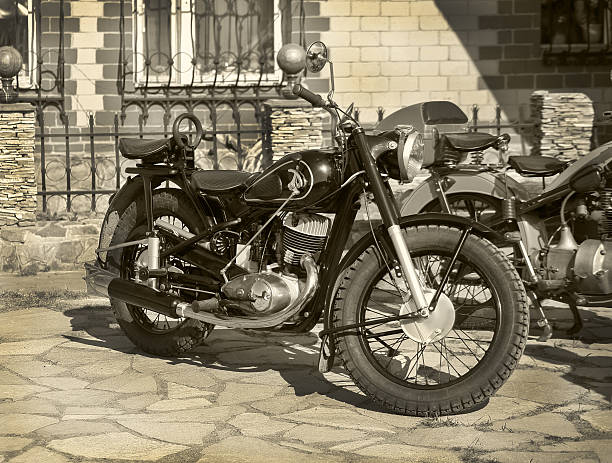 istock Retro motorcycle in court yard 494005648