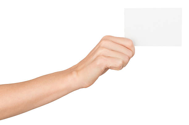 istock Womans right hand with small blank paper 494005730