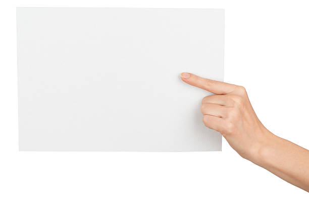 istock Girls hand with pointer finger holding blank card 494006594