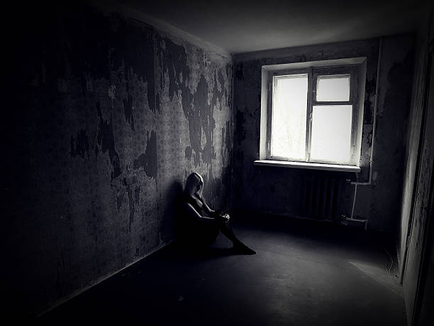 istock Sad Girl is sitting on the floor 494008186