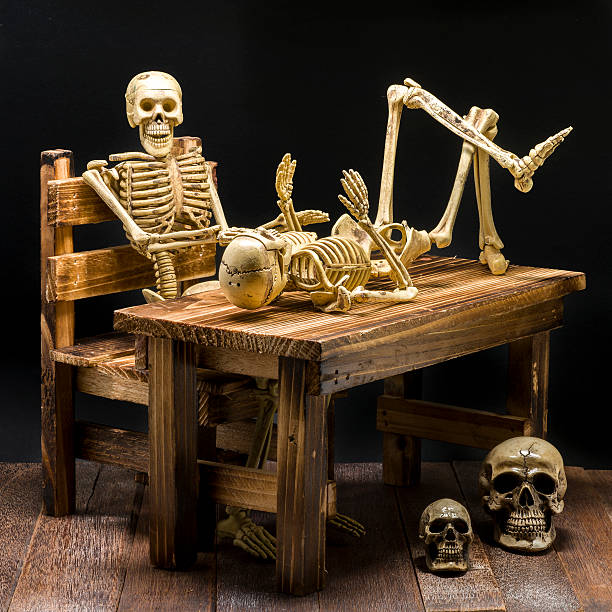 istock Still life of model skeleton in Halloween concept 494008396