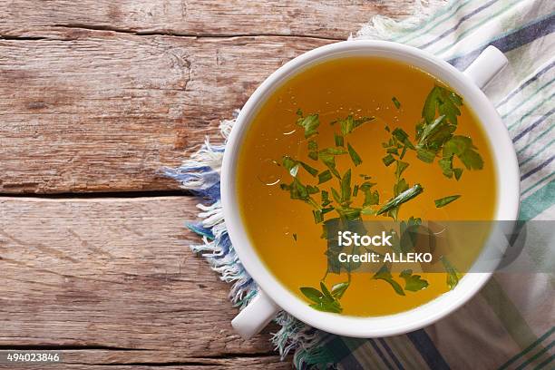 Meat Broth With Parsley In Bowl Closeup Horizontal Top View Stock Photo - Download Image Now