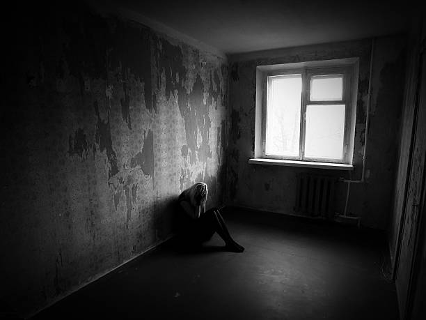 Sad Girl is sitting on the floor