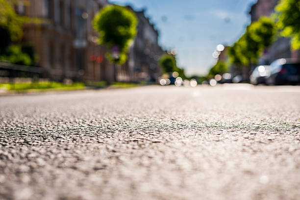 istock City on a sunny day, a quiet street with trees 494027116