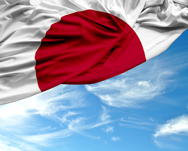 istock Japan waving flag on beautiful day 494030670