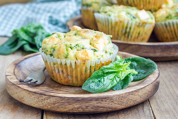 Snack muffins with spinach and feta cheese stock photo