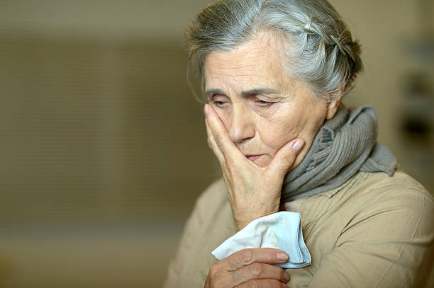 istock Sad aged woman 494031760