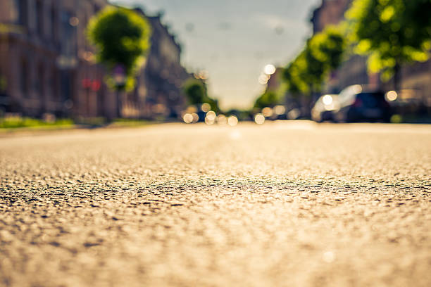istock City on a sunny day, a quiet street with trees 494032426