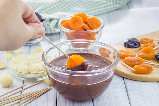 istock Making apricot and prunes lollipops 494033010