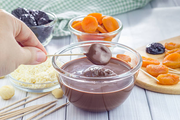 Making apricot and prunes lollipops