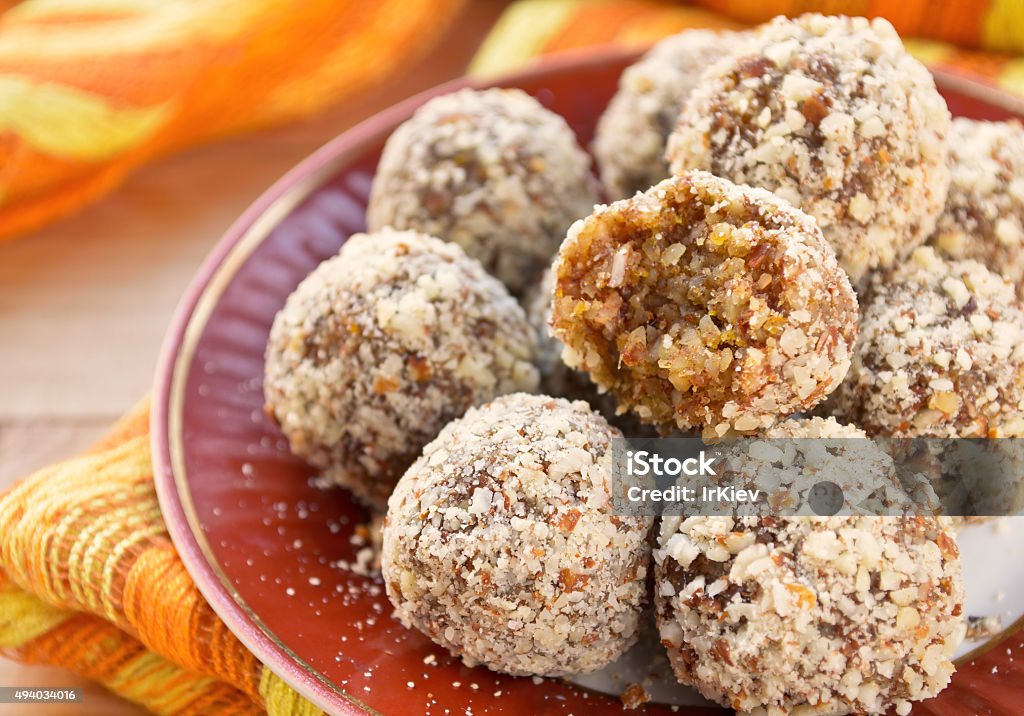 Healthy homemade candies witn nuts and dry fruits Healthy homemade candies witn nuts and dry fruits. Selective focus. 2015 Stock Photo