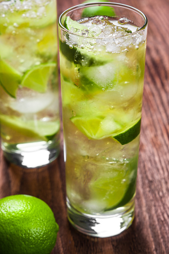 Fresh cocktail with lime slices