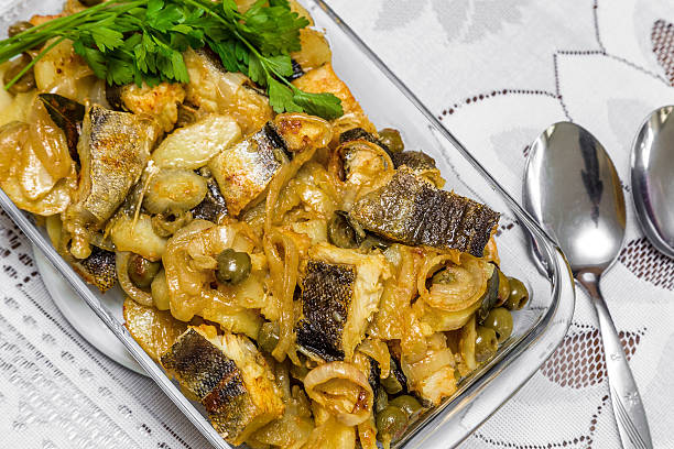istock Delicious and traditional portuguese codfish with potatoes 494034818