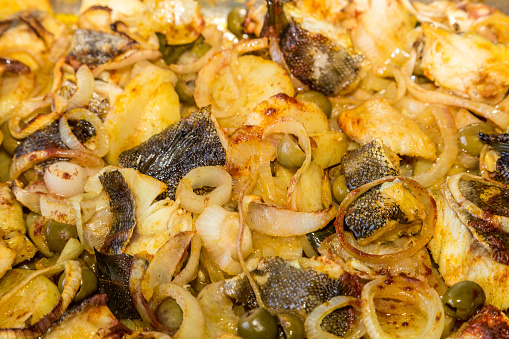 Delicious and traditional portuguese codfish with potatoes