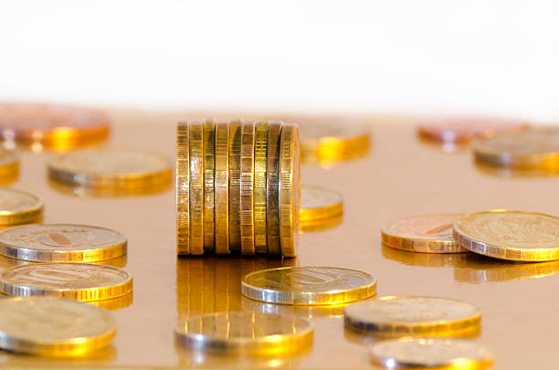istock Coins are reflecting in the Golden surface 494036539