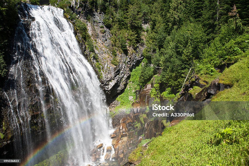 Summer Waterfall Water cascading over a falls. Beauty Stock Photo