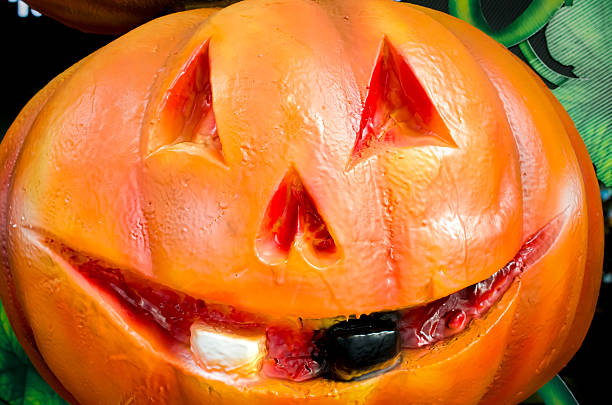 Pumpkins for Halloween Close up of pumpkins for Halloween halloween pumpkin human face candlelight stock pictures, royalty-free photos & images