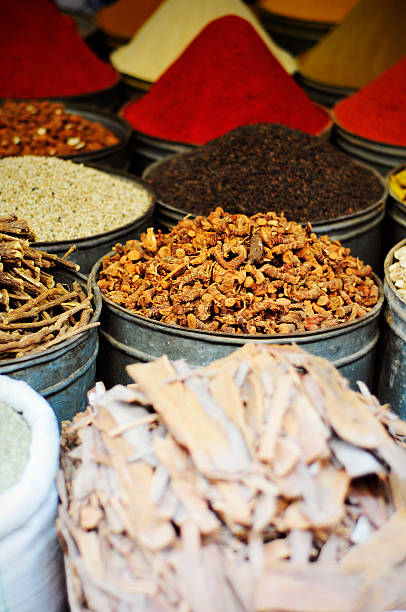 istock Street market with cinnamon, pepper, sessame and condiments 494037749