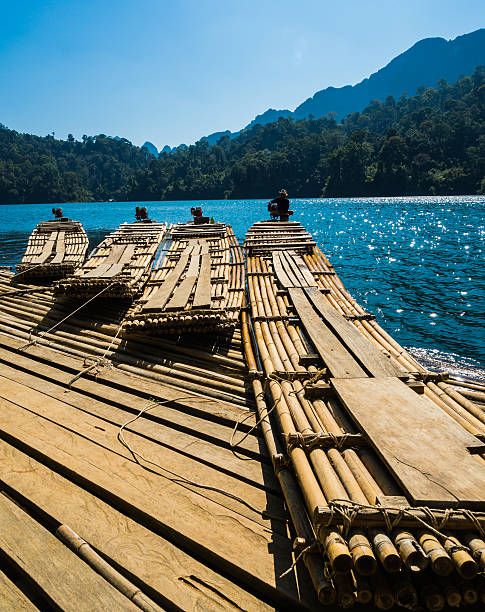 istock Bamboo Rafts in Rajjaprabha Dam or Chiew Lan Dam, Thailand 494039979
