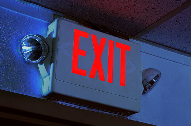 Exit Sign Exit sign illuminated in the dark exit sign photos stock pictures, royalty-free photos & images