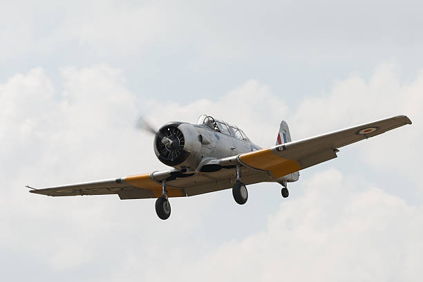 Cambridge, UK - May 27, 2012: A vintage North American Harvard trainer in RAF colours seen at Duxford Air Show.