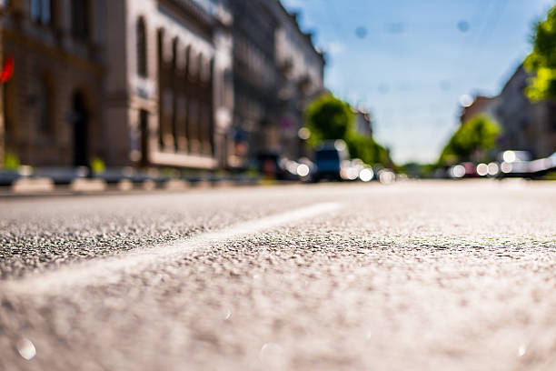 istock City on a sunny day, a quiet street with trees 494054976