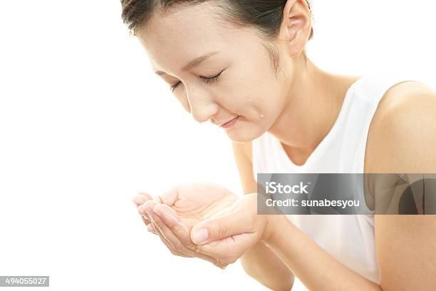 Woman Washing Her Face Stock Photo - Download Image Now - Adult, Bathroom, Beautiful Woman