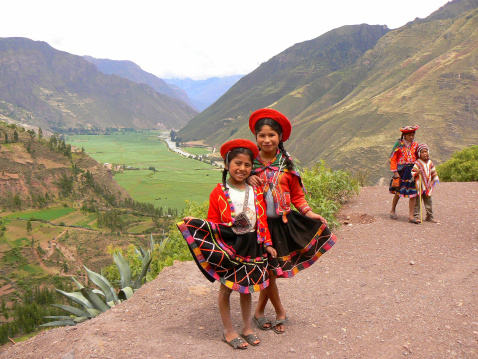 Machu Picchu,Peru-November 16,2006:Two girls from Quecha Tribe standing on the road.