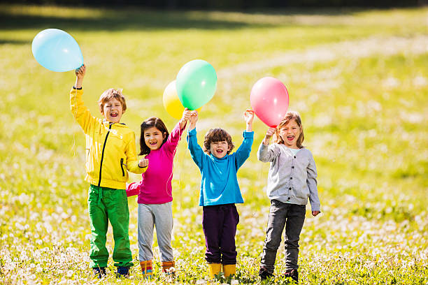 istock Cheerful children outdoors. 494056447