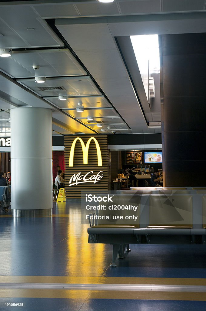 McDonald outlet Chongqing, China - May 11, 2014: McDonald outlet in terminal building at Chongqing Jiangbei International Airport. Airport Stock Photo