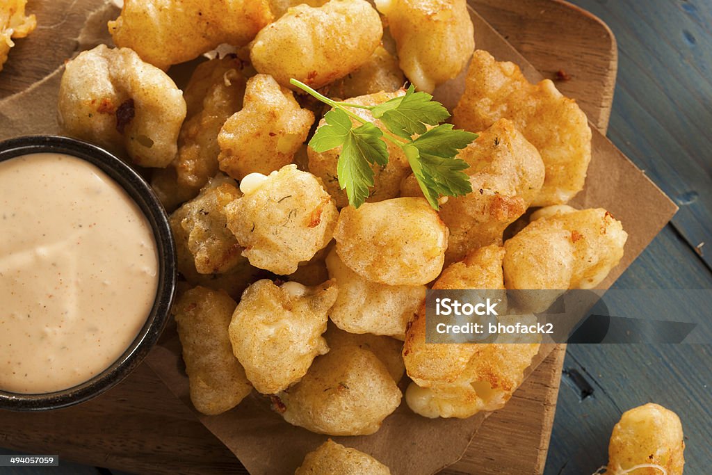 Beer Battered Wisconsin Cheese Curds Beer Battered Wisconsin Cheese Curds with Dipping Sauce Cheese Stock Photo