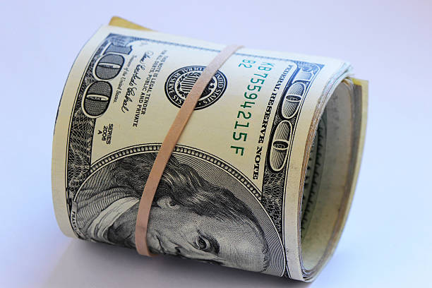 istock Roll of hundred dollar bills 494057663