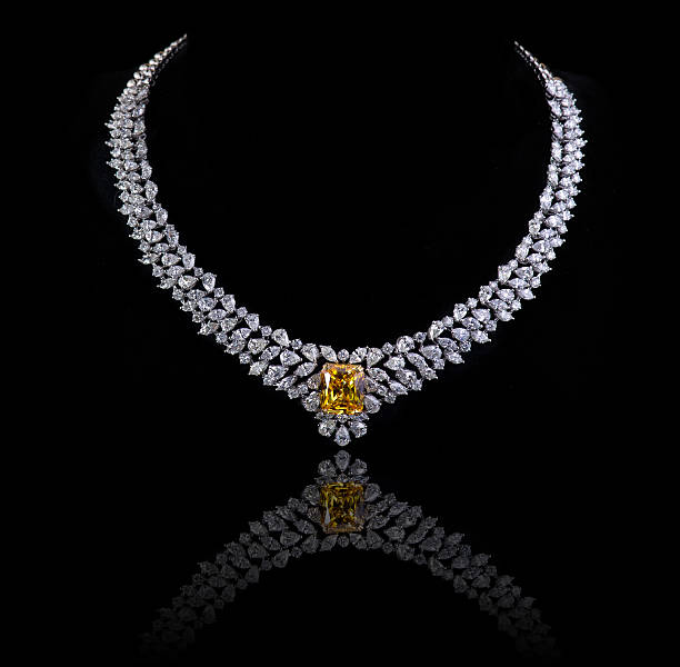 istock diamonds necklace shot against a black background 494058443