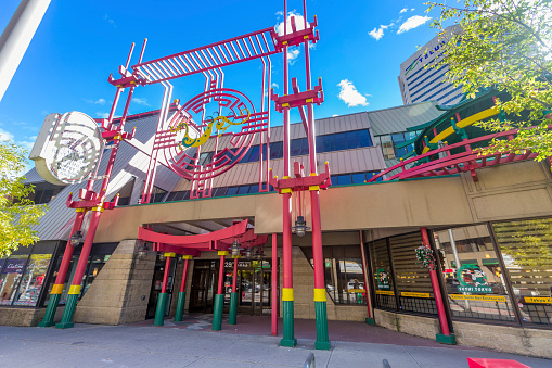 Calgary, Alberta, Canada - September 20, 2015: Entrance to the Chinatown dragon mall in Calgary downtown. Calgary's Chinatown is the fourth largest in Canada after those in Vancouver, Toronto, and Montreal. The size of Calgary's Chinatown is indicative of the relatively high proportion of people of Asian descent living in the city.
