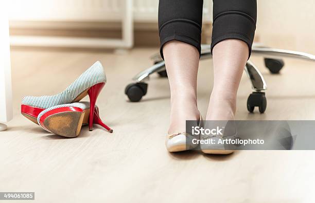 Photo Of Businesswoman Wearing Ballet Flats Stock Photo - Download Image Now - Adult, Adversity, Ballet