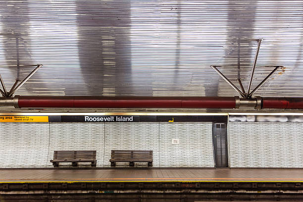 NYC subway station and bench NYC subway station and bench roosevelt island stock pictures, royalty-free photos & images