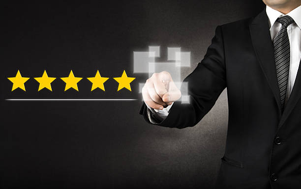 Businessman touching five stars