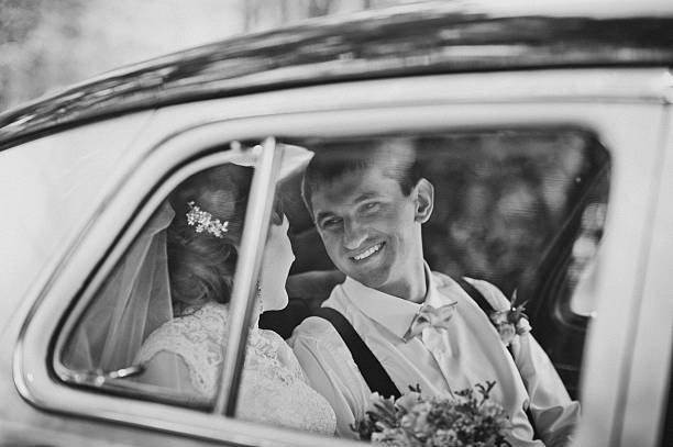 istock The couple sitting in vintage car 494063014