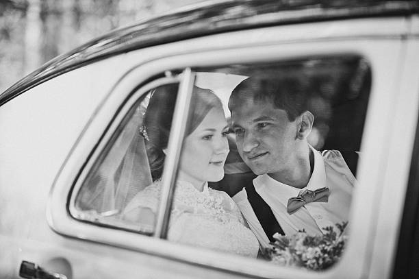 istock The couple sitting in vintage car 494063064