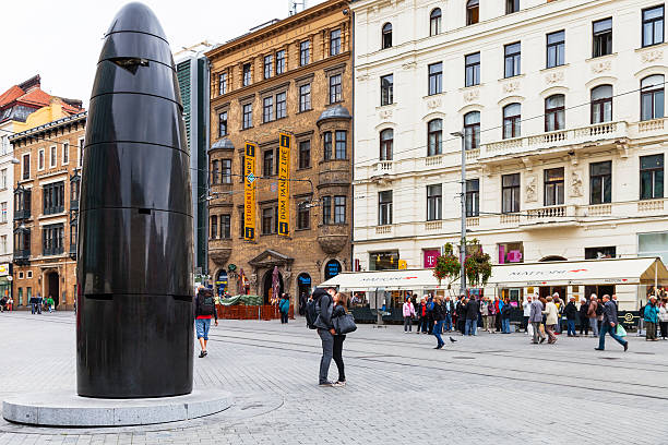 Brno, Czech Republic - September 25, 2015: people on Freedom square (namesti Svobody) in Brno city. Freedom square is the main, biggest and probably the oldest square in Brno.