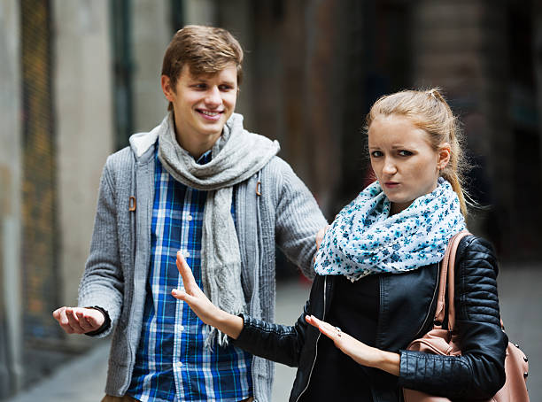 istock Public harassment: man chasing  irritated girl 494064766