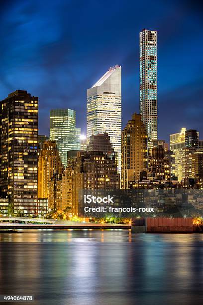 Midtown Manhattan Skyscrapers And East River After Sunset New York Stock Photo - Download Image Now