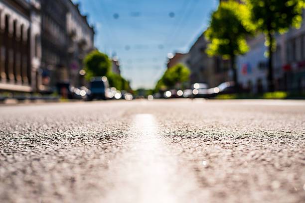 istock City on a sunny day, a quiet street with trees 494066448