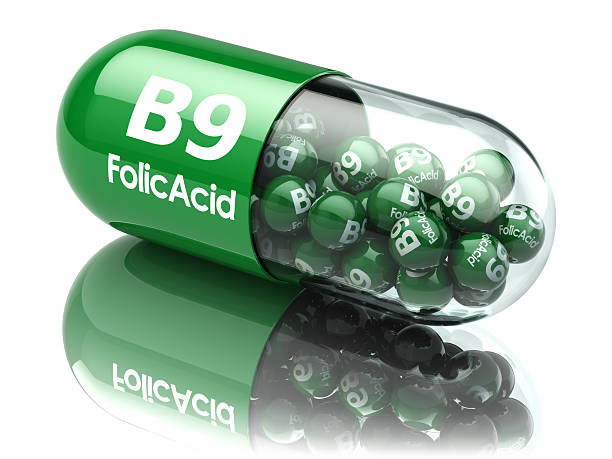 Pills with b9 folic acid element. Dietary supplements. Vitamin c stock photo
