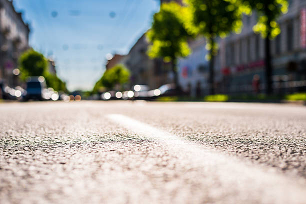 istock City on a sunny day, a quiet street with trees 494066654