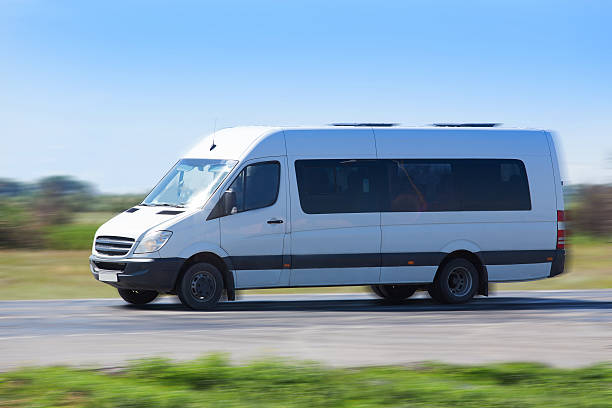 istock minibus goes on the country highway 494086820