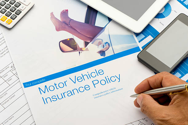 istock Close up of a Car insurance policy with car image 494087582