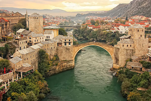 Town of Mostar with Stari Most, Bosnia and Hercegovina Town of Mostar and Stari Most at sunset, Bosnia and Hercegovina bosnia and herzegovina photos stock pictures, royalty-free photos & images