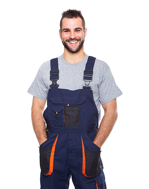 istock Portrait of smiling worker in blue uniform 494091719