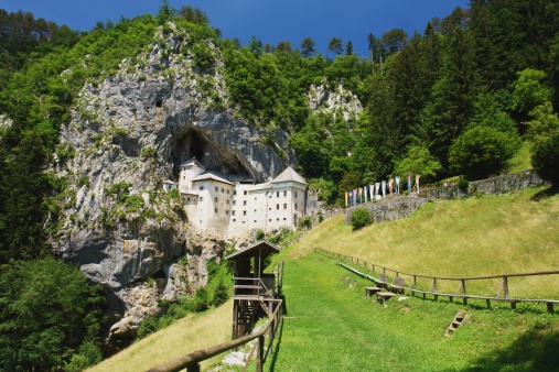 Postojna, Slovenia - June 21, 2011: Predjama Castle is a Renaissance castle built on the edge of the cave in karst areas in Slovenia.